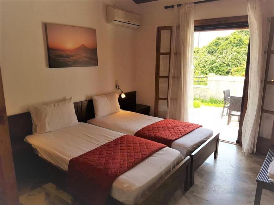 Amalia Cottages Агиос-Гордиос Экстерьер фото